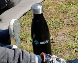 Cropped picture of a Netlify bottle